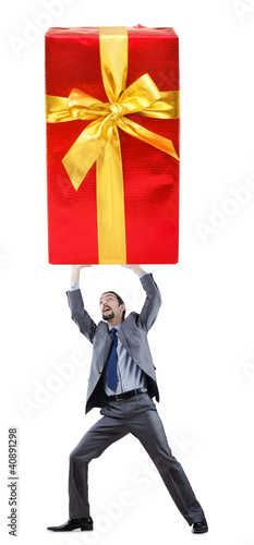 Photo: Businessman with gift boxes on white Businessman with gift boxes on white