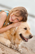 child and her dog