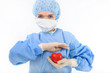 Photo: female nurse holding a heart female nurse holding a heart