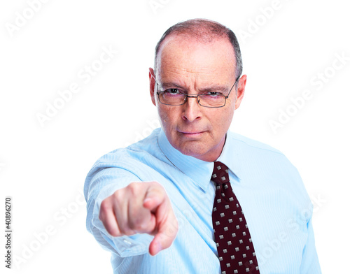 Photo: Skeptical businessman. Skeptical businessman.