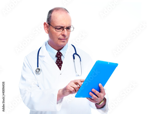 Photo: Doctor with tablet computer. Doctor with tablet computer.