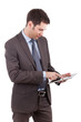 Young caucasian businessman using a tablet pc