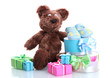beautiful gifts, baby's bootees and bear toy  isolated on white