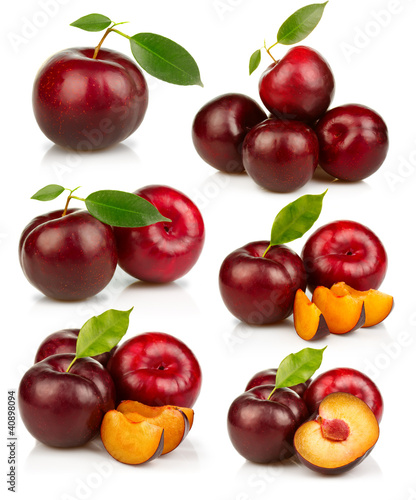Photo: Set of ripe red plums fruit isolated on white Set of ripe red plums fruit isolated on white