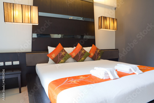 Photo: Hotel room with bed and wooden Hotel room with bed and wooden