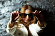 Showing sunglasses