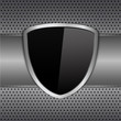 canvas print picture - Black shield on metal background