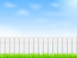White fence and blue sky