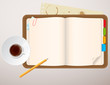 notebook and a cup of coffee notebook and a cup of coffee