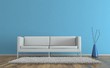 Wohndesign - Sofa vor blauer Wand