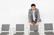 canvas print picture - Man standing by chairs in waiting room
