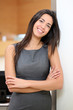 Beautiful businesswoman standing in hall Beautiful businesswoman standing in hall