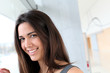 Detalii fotografie Portrait of beautiful girl standing in hallway