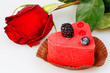 Cake with berries, blackberries and red rose