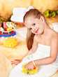 Child washing in bubble bath .