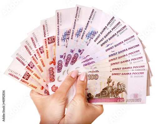 Photo: Female hand with money Russian rouble. Female hand with money Russian rouble.