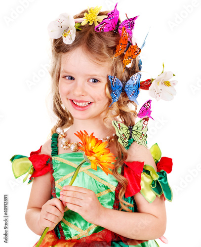 Photo: Child in spring hairstyle and butterfly. Child in spring hairstyle and butterfly.