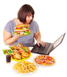 canvas print picture - Woman eating junk food.