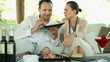 Young man feeding his girlfriend with fresh salad