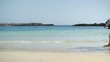 Young couple walking on the beach, slow motion