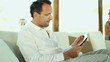 Happy young man with tablet computer