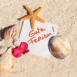 Blank paper beach sand starfish shells summer