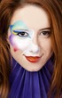 Beautiful redhead girl with make-up.