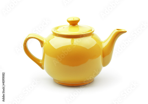 Foto: Bright orange teapot isolated on white background Bright orange teapot isolated on white background