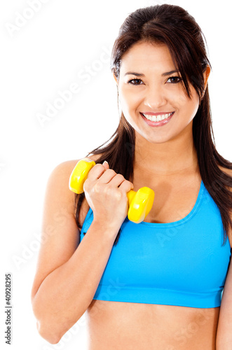 Photo: Woman lifting weights Woman lifting weights