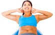 Woman doing Pilates exercises