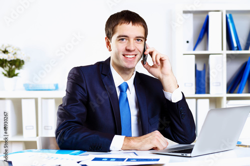 Photo: Young businessman in office Young businessman in office