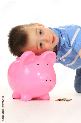 Photo: Kind mit Sparschwein Kind mit Sparschwein