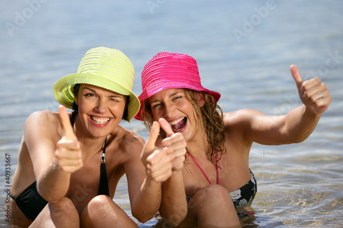 Photo: Two women bathing in the sea Two women bathing in the sea