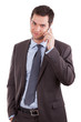 Portrait of a young caucasian business man using a mobile phone