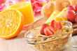 Breakfast with coffee, rolls, egg, orange juice, muesli & cheese
