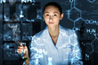Photo: Young chemist working in laboratory Young chemist working in laboratory