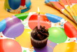 1st Birthday with Lit Candle Over Yellow