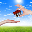 hands holding house hands holding house
