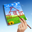 House from white clouds against blue sky