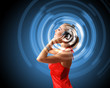 Illustration: Young woman in evening dress with headphones Young woman in evening dress with headphones