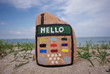 stone mobile phone on the sand