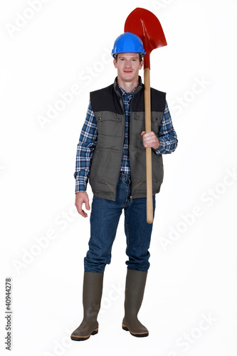 Photo: Construction worker with a shovel Construction worker with a shovel