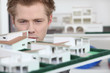 Property developer inspecting model Property developer inspecting model