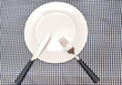 Tableware on blue napkin
