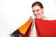 Woman holding numerous shopping bags