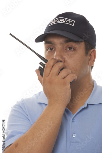 Photo: Security guard hand holding cb walkie-talkie radio Security guard hand holding cb walkie-talkie radio
