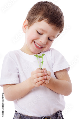 Photo: Boy with sprouts in hands Boy with sprouts in hands