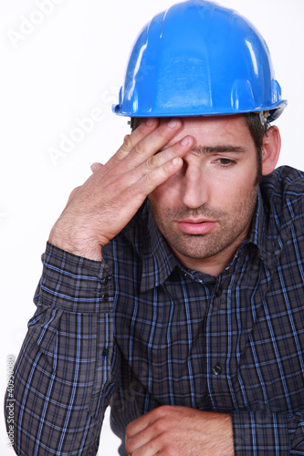 Photo: Engineer with a headache Engineer with a headache