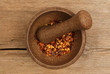 Chilli in pestle and mortar