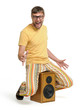 Funny man dancing on the speaker, concept party Funny man dancing on the speaker, concept party